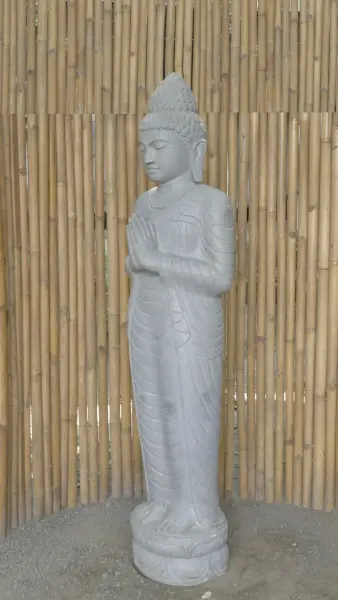 Product image 3 of the product “Standing Buddha made of Riverstone, position Namaskara , H. 185cm. There is a stone eye on the right thight. ”